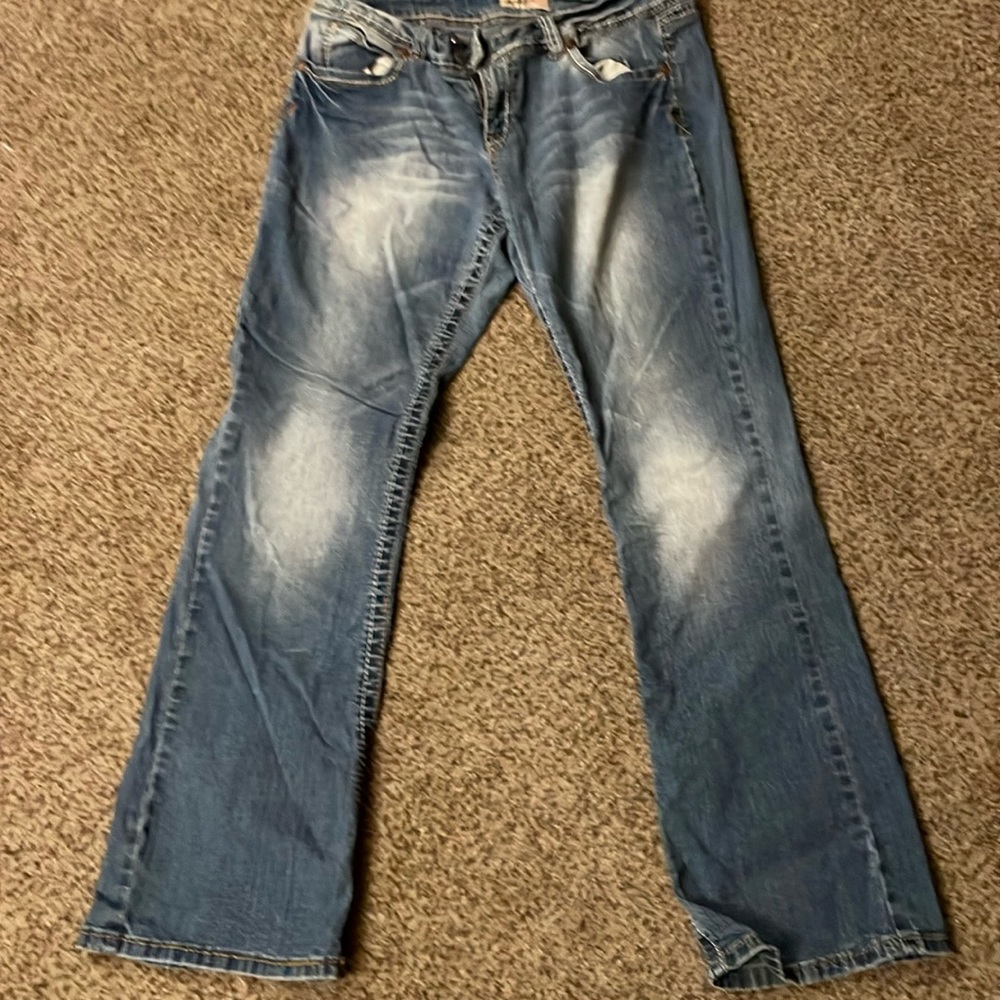 Ladies blue jeans faded white pattern